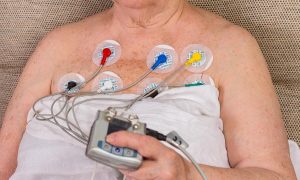 disposable-electrodes-senior-woman-medical-electrodes-round-pads-sticker-patient-selective-focus_557984-25